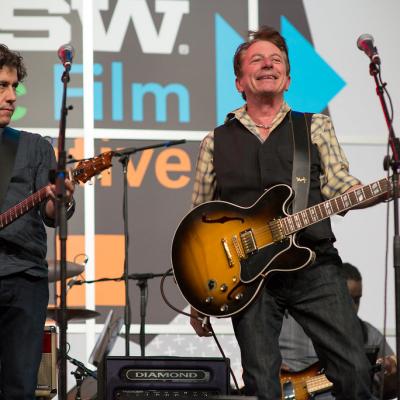 David Grissom on stage with Joe Ely